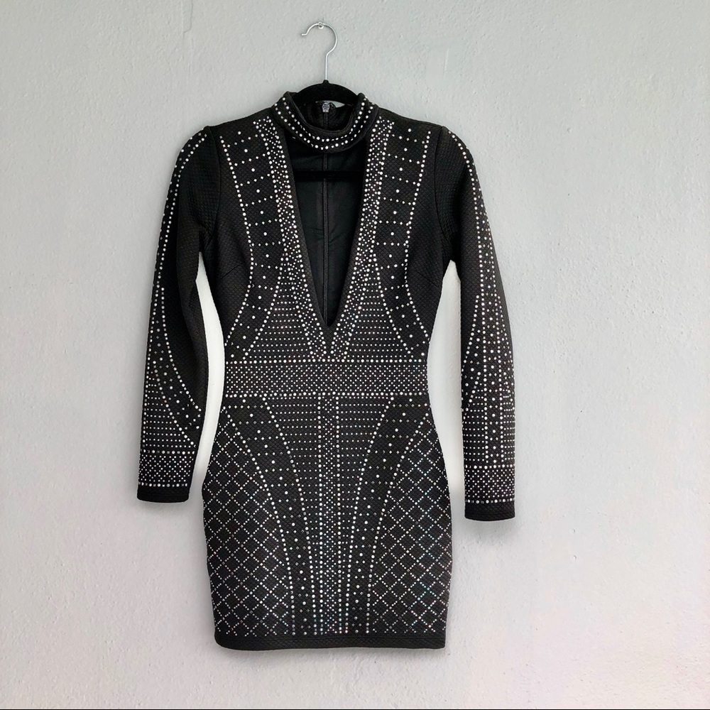 Bebe XS long sleeve mini low cut black dress